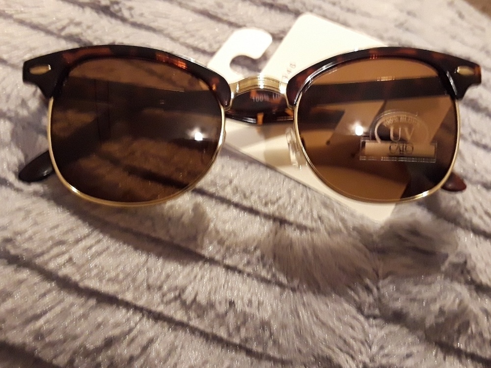 Half frame tortoise shell sunglasses